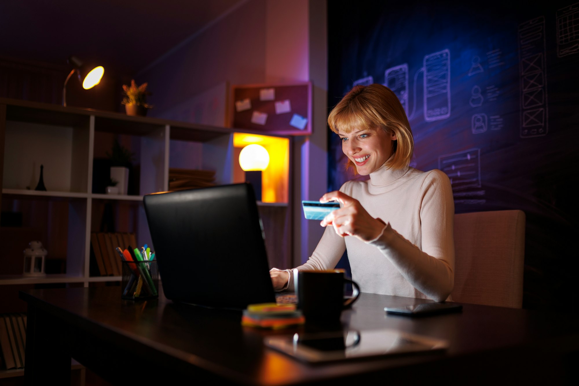 Woman doing online shopping inserting credit card number